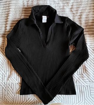 Top negro manga larga cuello polo