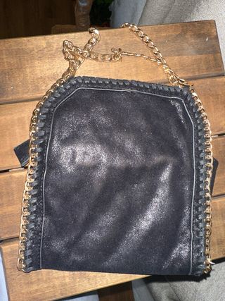 Bolso de mano Xti negro y dorado