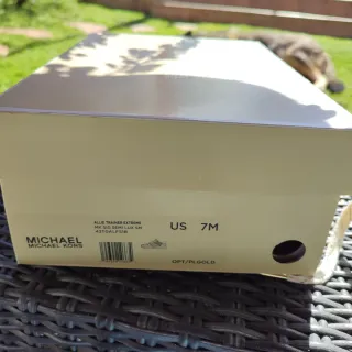 Zapatillas Michael Kors Doradas y Blancas