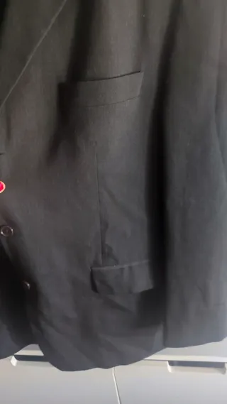 Traje chaqueta y chaleco gris oscuro