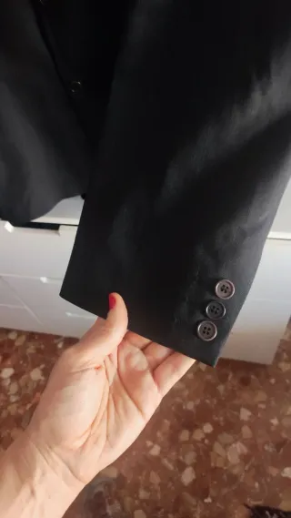 Traje chaqueta y chaleco gris oscuro