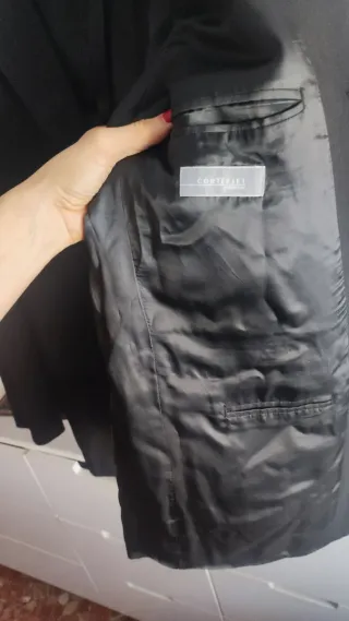 Traje chaqueta y chaleco gris oscuro