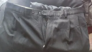 Traje chaqueta y chaleco gris oscuro