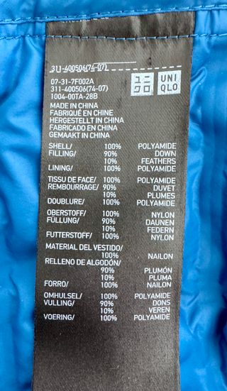 Plumas Uniqlo con capucha Talla XL