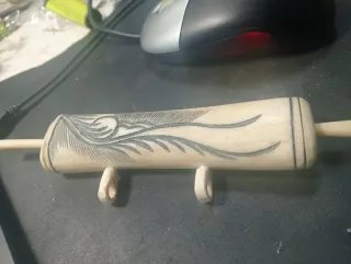 Bolsa Osso Bornéu Esculpido