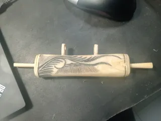 Bolsa Osso Bornéu Esculpido