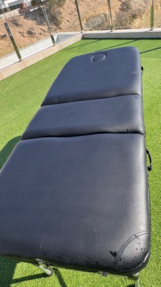 Cama  de masaje.