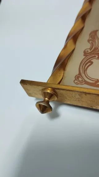 Reloj de pared antiguo dorado