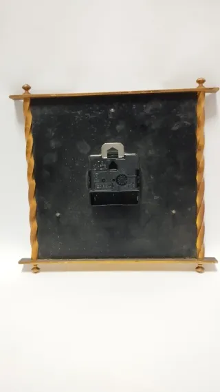 Reloj de pared antiguo dorado