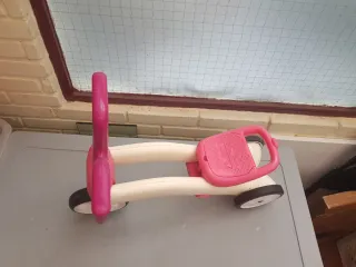 Triciclo infantil rosa y beige