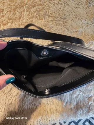 Bolso negro tejido Stradivarius