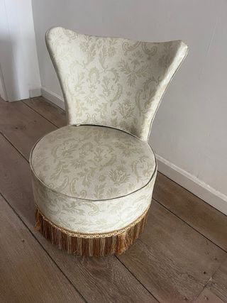 Butaca antigua tapizada