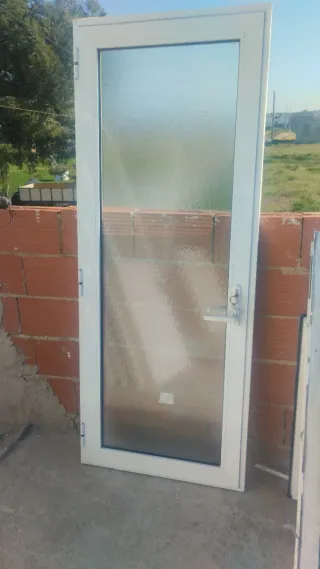 Puerta Climalit con cristal