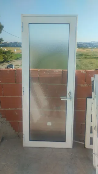 Puerta Climalit con cristal