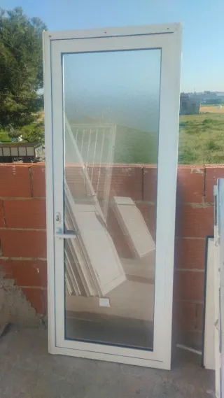 Puerta Climalit con cristal