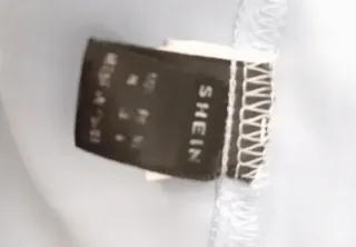 Blusa azul cielo con volantes