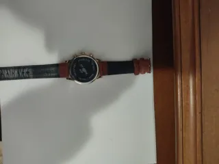 Reloj Skyline Dorado y Marrón