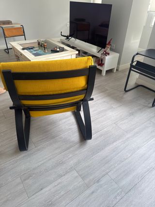 Poltrona a dondolo in legno e tessuto