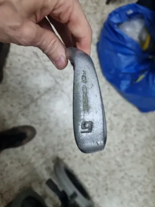 Dos juegos de palos de golf