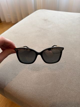 Gafas de sol Michael Kors negras y doradas