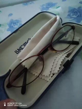 Occhiali da vista Luxottica montatura rossa