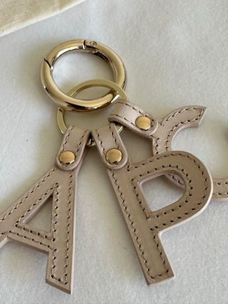 Llavero A.P.C. Letras