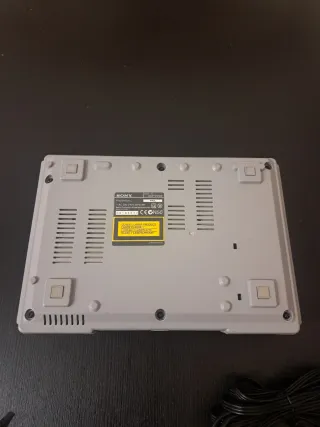 Playstation 1 Gris + Mando + Funda