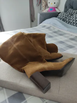 Botas de piel por encima de la rodilla