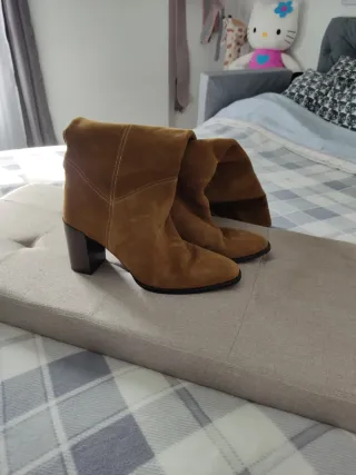 Botas de piel por encima de la rodilla