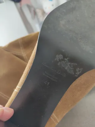 Botas de piel por encima de la rodilla