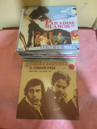 Lote 50 vinilos Singles varios estilos musicales.