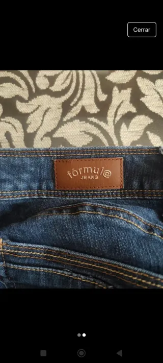 Vaqueros y blusa verde