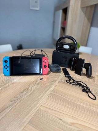 Nintendo Switch + 64GB + Accesorios
