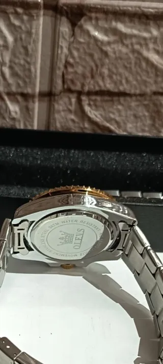 Reloj Olevs esfera verde y oro