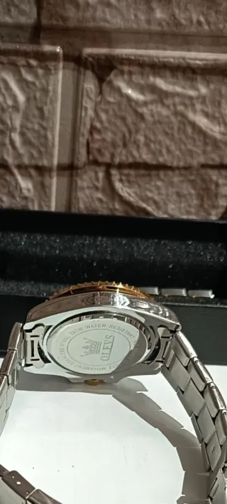 Reloj Olevs esfera verde y oro