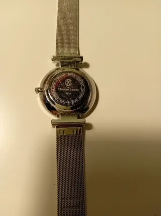 Reloj de pulsera de malla plateada