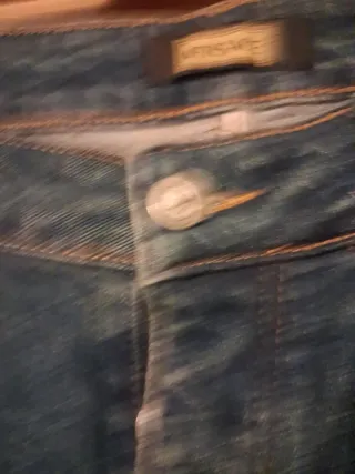 Pantalones vaqueros Versace con logo