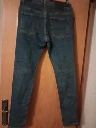 Pantalones vaqueros Versace con logo