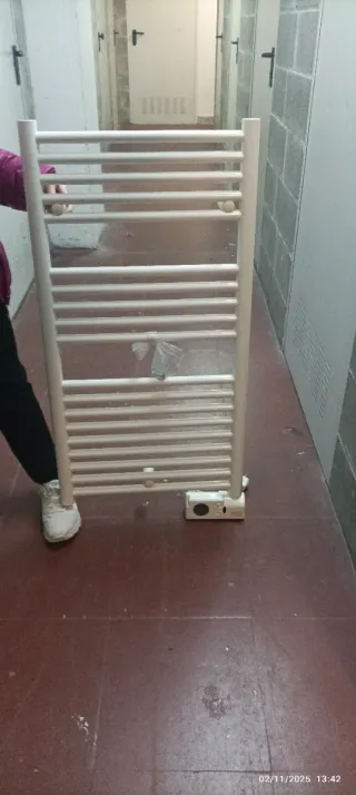 Secador de toallas eléctrico