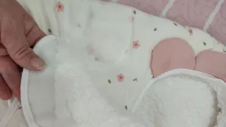 Saco arrullo bebé flor rosa