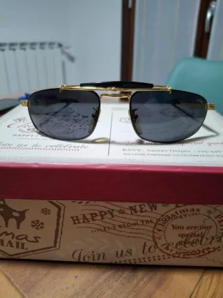 Occhiali da sole Sting neri e oro