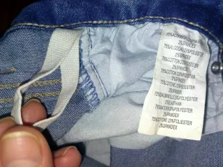 Pantalón vaquero con bordado y flecos