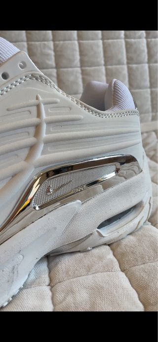 Nike NOCTA Plata y Blanco