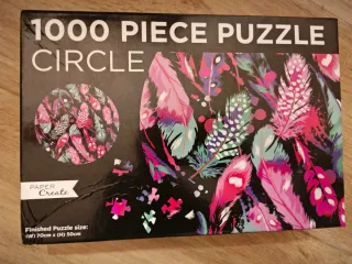 Puzzle 1000 piezas Plumas Circle