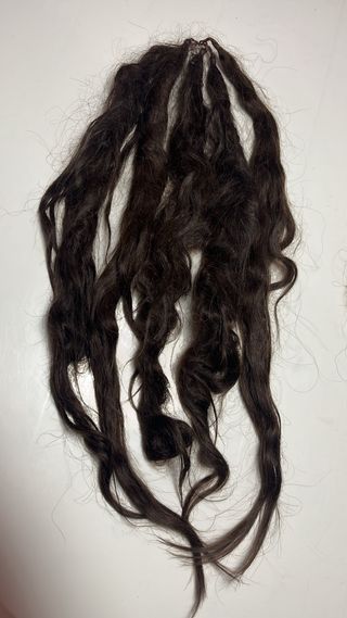 Mallas de pelo castaño oscuro
