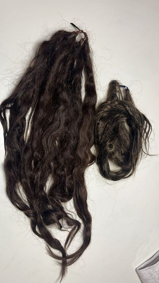 Mallas de pelo castaño oscuro