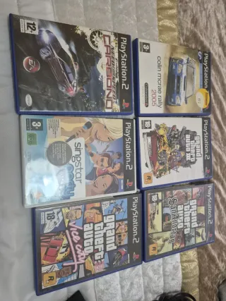 Consola PlayStation 2 con juegos