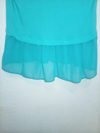 Blusa turquesa con chifón