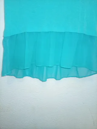 Blusa turquesa con chifón