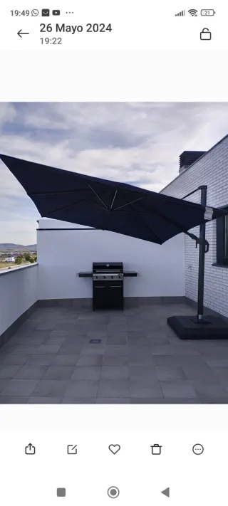 Parasol azul con pie de 100kg